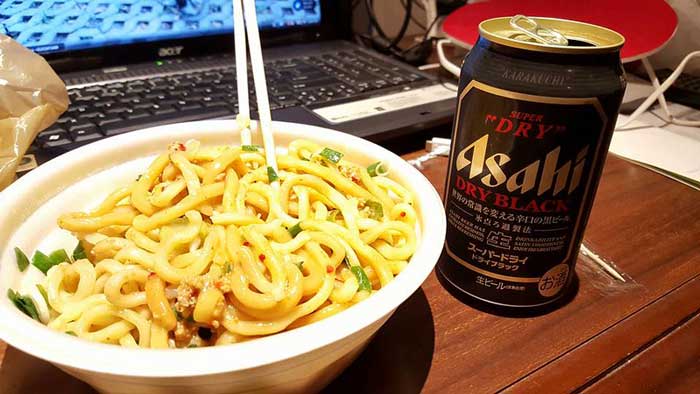 Udon, Asahi beer, and a laptop in Japan