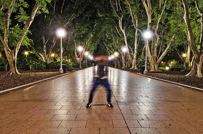 Blurred photo of a man in a park