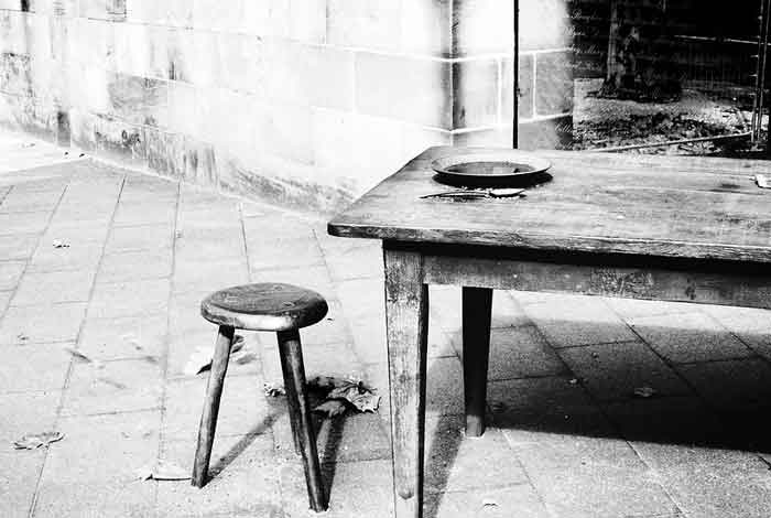street photography of a chair and table