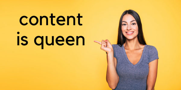a woman pointing to content is queen text